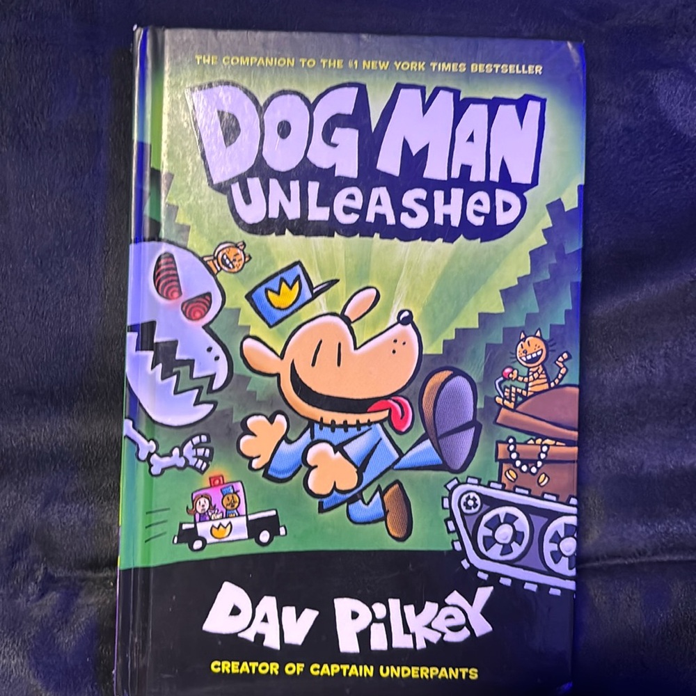 Dog Man Unleashed book. Hard covered book. EUC.